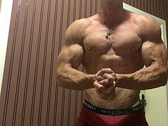 Alpha Muscle God flexes unbelievable muscles