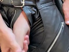 Leather daddy bomb in leather jeans and leather chaps