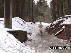 Daria Glover skates around in snow to find a proper place to pee