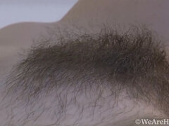 Sasha K enjoys her hairy body while in bed