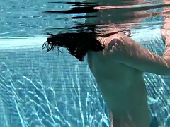 Jessica Lincoln swims sexy naked in the pool