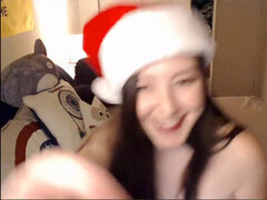 very Busty Camgirl in Santa Hat Rides dildo Before nutting