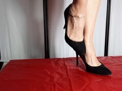 High heels, foot worship, female domination