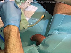 The first painful insertion of a catheter with cumshot into the urethra