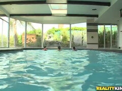 Sexy Swimmers - wet lesbian threesome orgy in the pool starring blonde Kiara Diane
