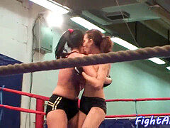 nude lesbos grappling in a boxing ring