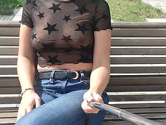 Transparent blouse shows her tits in public