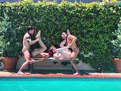 Outdoor athletic studs enjoy a bareback orgy in the pool