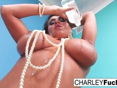 Charley Chase gets lubed up and adorned in jewelry