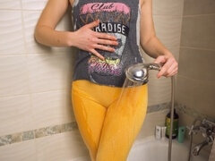Naughty Asian newbie in tight yoga pants gets wet in the bathroom