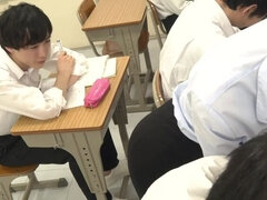 Young Japanese teacher helps her student