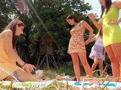 Gorgeous women with massive tits and booties turn an outdoor party into a flirty, no-pants game session
