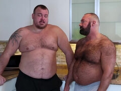 Two fat guys with sexy bellies fucking in the kitchen