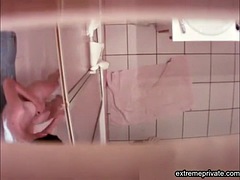 Spying on my stepsister shaving her pussy