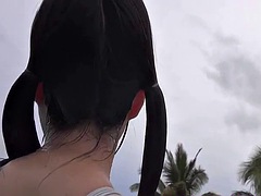Busty Asian teen posing in swimsuit