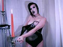 Vampire goth Plays with Candles