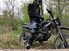 Handsome BIKER RIDING A MOTORCYCLE IN THE FOREST HANDKS AND CUMES IN PUBLIC