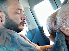 Rimjob stud fists hairy asshole hunk in the van with gloves