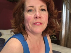 Chubby housewife plays with her soaking wet pussy in bed