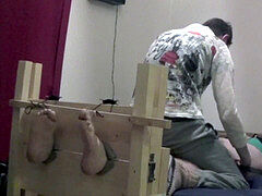 man all strapped up and tickled in Stocks