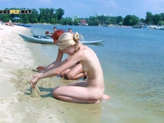 Nudist young girl is enjoying the sun