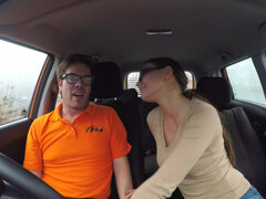 Tina Kay relaxes with a help of driving instructor