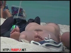 Covert web cam at the beach records naturist life moments