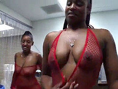 Young ebony duo take turns inhaling milky man in a store room