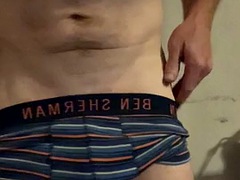 After a hard day at work, straight apprentices change into cum-stained boxers. Impress with a bulge