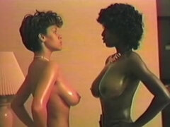 Two busty black lesbian babes in Vintage Boobfight