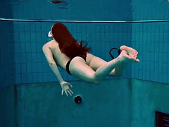 Fun Czech girl Vesta swims naked and horny.