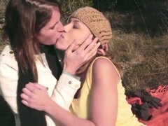 Gorgeous pornstars Kara Price and Audrey Rose have public strap-on lesbian sex