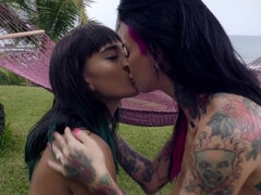 Janice Griffith and Joanna Angel licking passionately outdoors