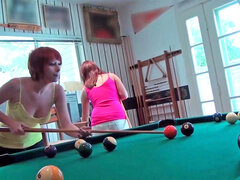 Redhead and plus brunette girls are playing pool in this movie