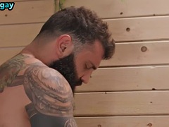 Sauna stud barebacked by a huge tattooed bear until he cumshot