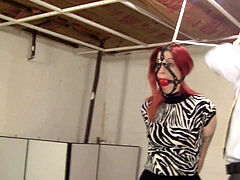 frogtied, ballgagged and full of restrain bondage with ankle shoes on