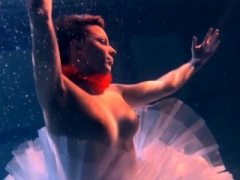 Bulava Lozhkova with a red tie and plus skirt underwater