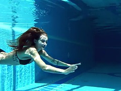 Tiffany Tatum shows off her hot ass underwater