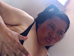 Beautiful mature woman films herself at home alone with huge tits. Want to keep her company?