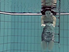 Naked Russian mermaid in the pool