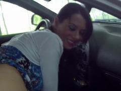 Nice-looking young and fresh wife gives her fella a blowjob in the car