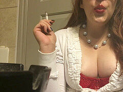 Chubby Teen Smoking Goddess showing off Big perky mammories Red Bra and Sweater