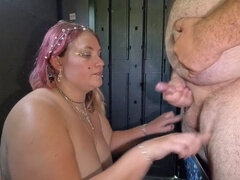Naughty mom Bonnie gives a sloppy blowjob in the shed while people are around!