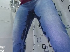Pissing desperation wetting jeans