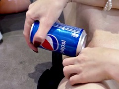 Tiffany works out her pussy with a can of Pepsi