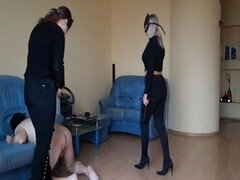 Monica instructs her pet during an intense female domination session