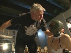 Horny submissive in mask receives spankings on her ass