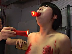 This Asian bitch loves to be treated with bdsm and a wax show