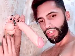 Young Latino Camilo Brown deepthroats, anal and facials with a big load of 9 inch dildo