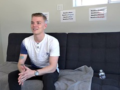 Solo amateur twink with tattoos jerks his cock at a casting